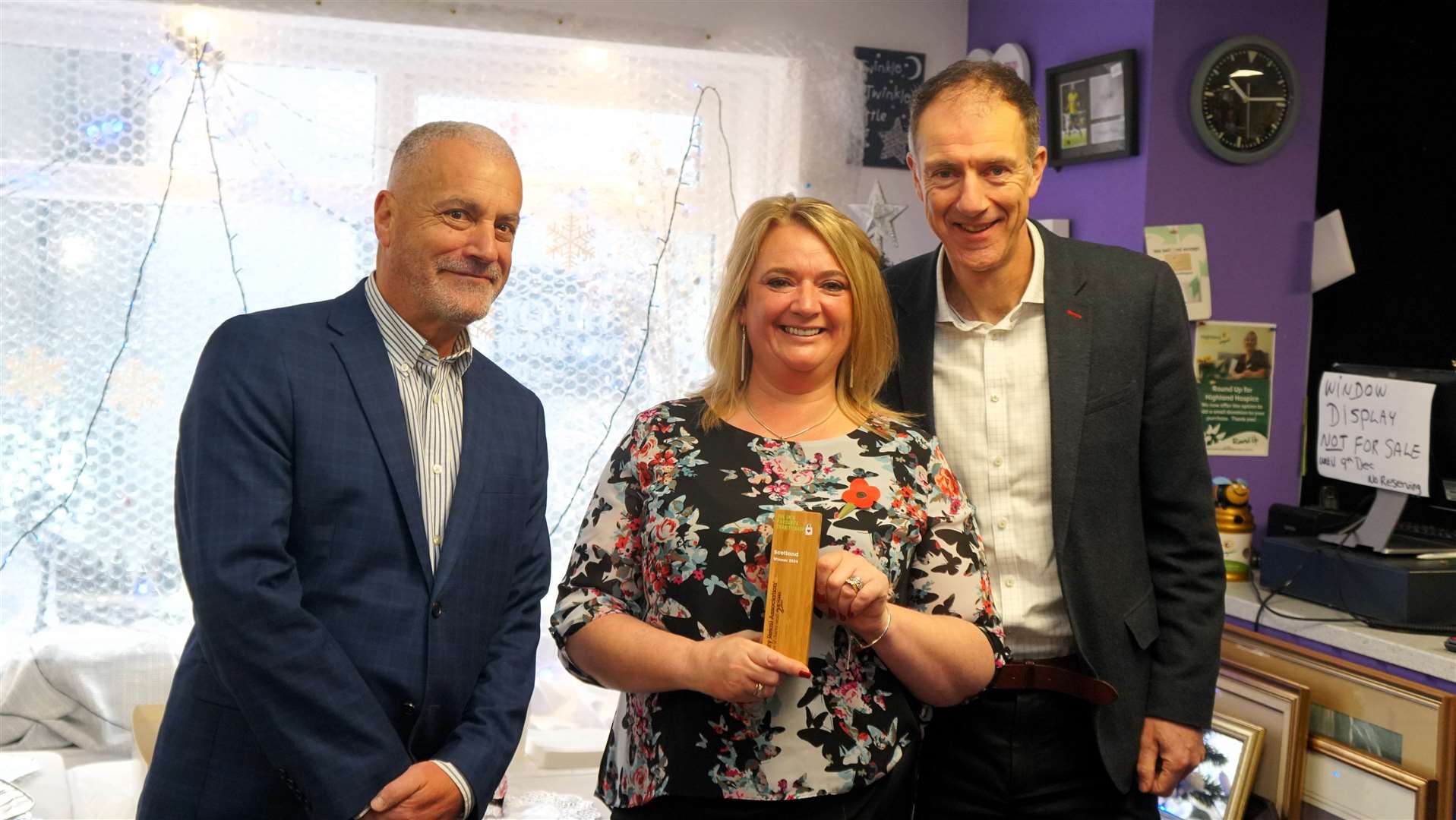 From left, Robin Osterley, CEO of the Charity Retail Association; Susan Imlach, manager of Highland Hospice's Thurso branch; and Kenny Steele, chief executive of Highland Hospice. Picture: DGS