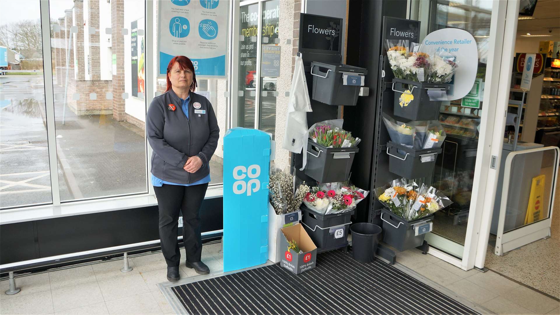 Wick Coop team member Kirsteen Mackenzie, who helped organise the raffle, stands at the position where the charity gifts were stolen. Pictures: DGS