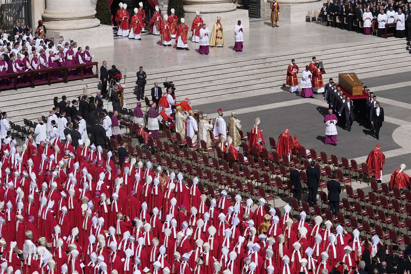 The coffin of Pope Francis is carried into St Peter’s Square for his funeral on Saturday (Gregorio Borgia/AP)