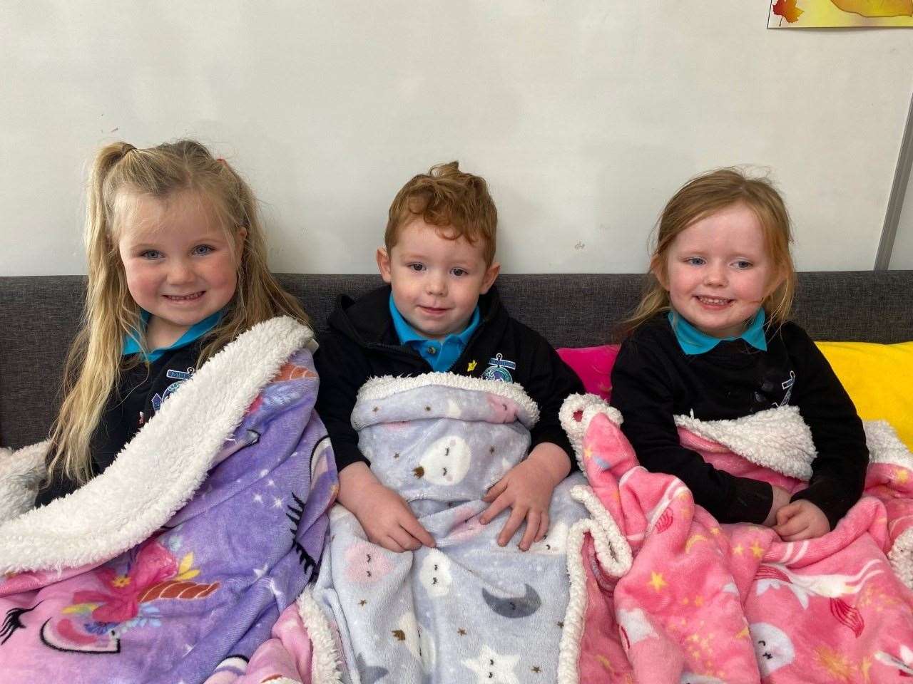 Cosy corner - all children have their own fleece blanket and are aware of where they can rest.