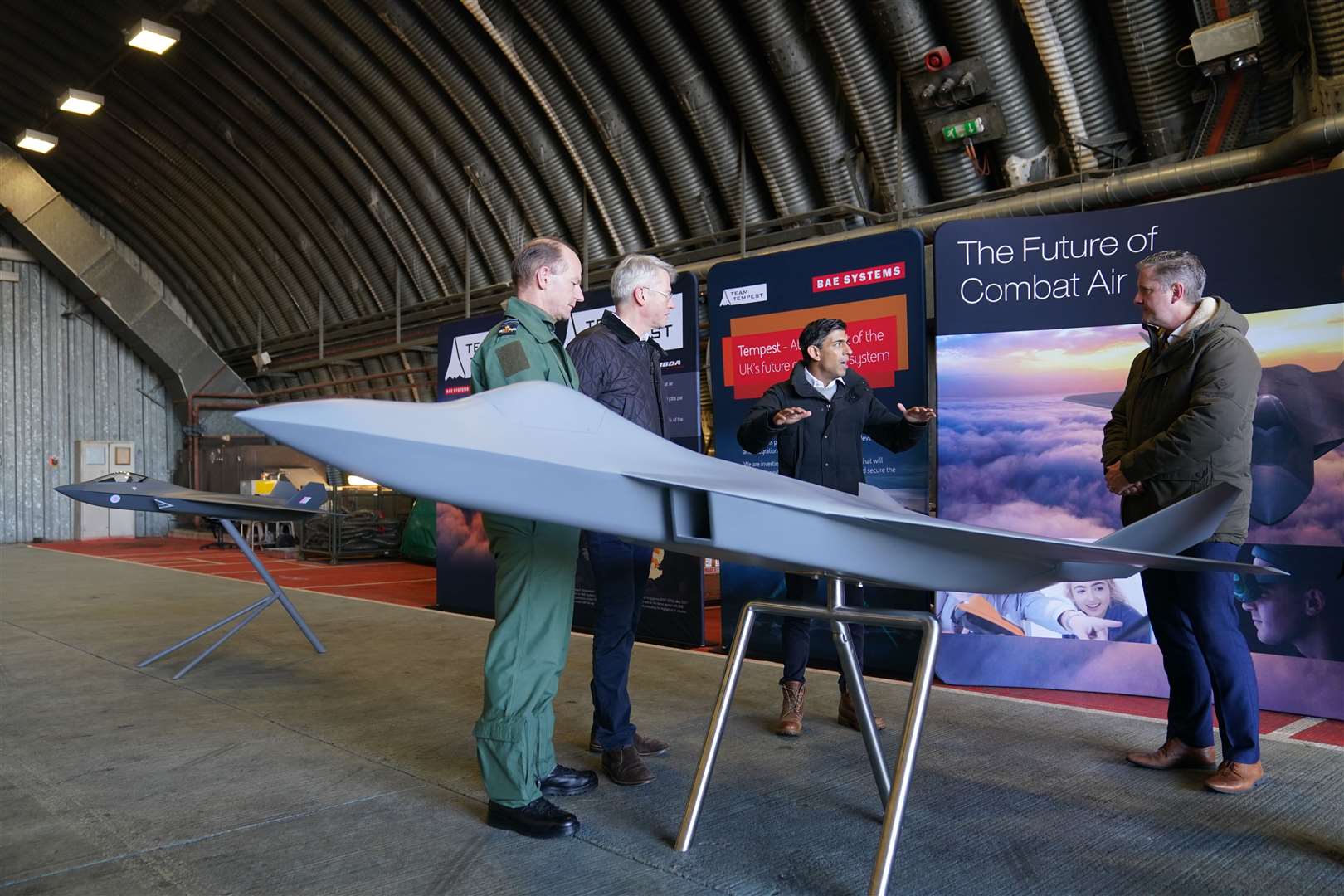 Prime Minister Rishi Sunak views a model of the Tempest fighter jet that is being developed (Joe Giddens/ PA)