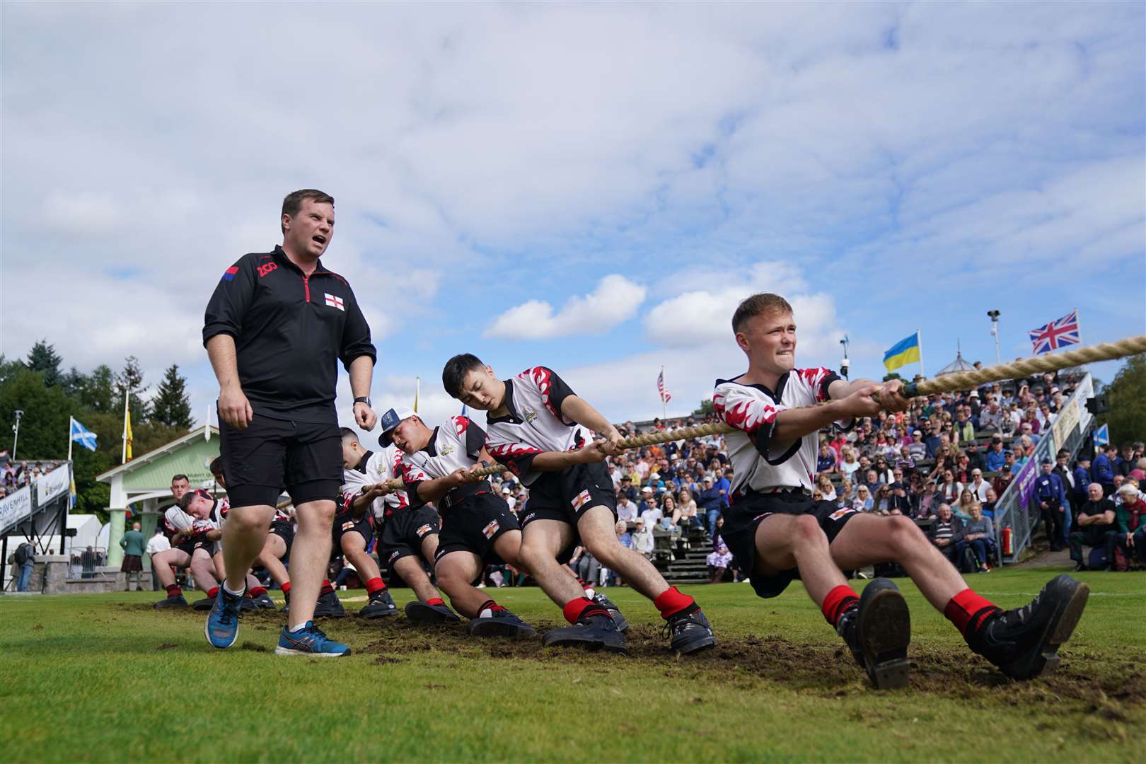 Tug-of-war competitors take the strain (Andrew Milligan/PA)