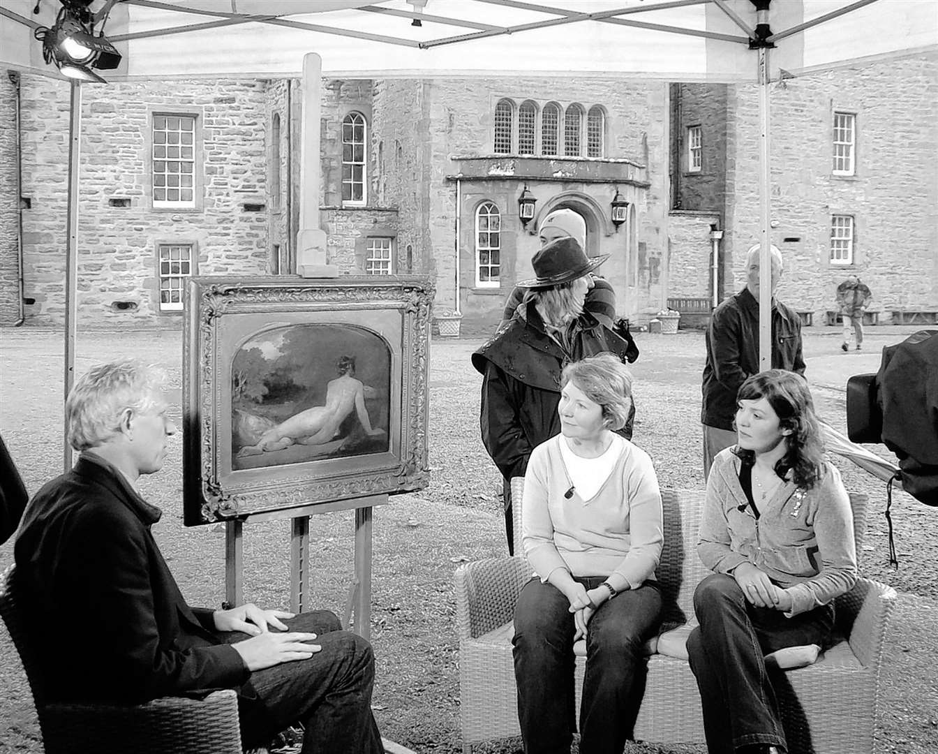 BBC Antiques Roadshow expert Rupert Maas evaluating a William Etty painting that was brought to the Castle of Mey for a programme that was broadcast in 2008.