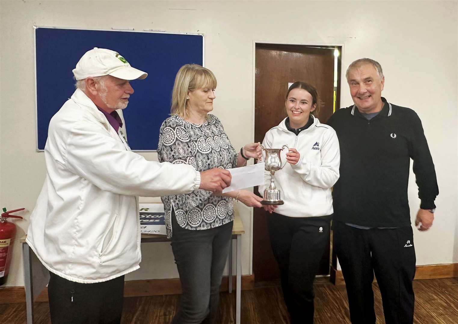 From left: Rosebank vice-president Donald Banks, Avril Budge, who presented the prizes, and winners Danielle Cowan and Stuart Cumming.