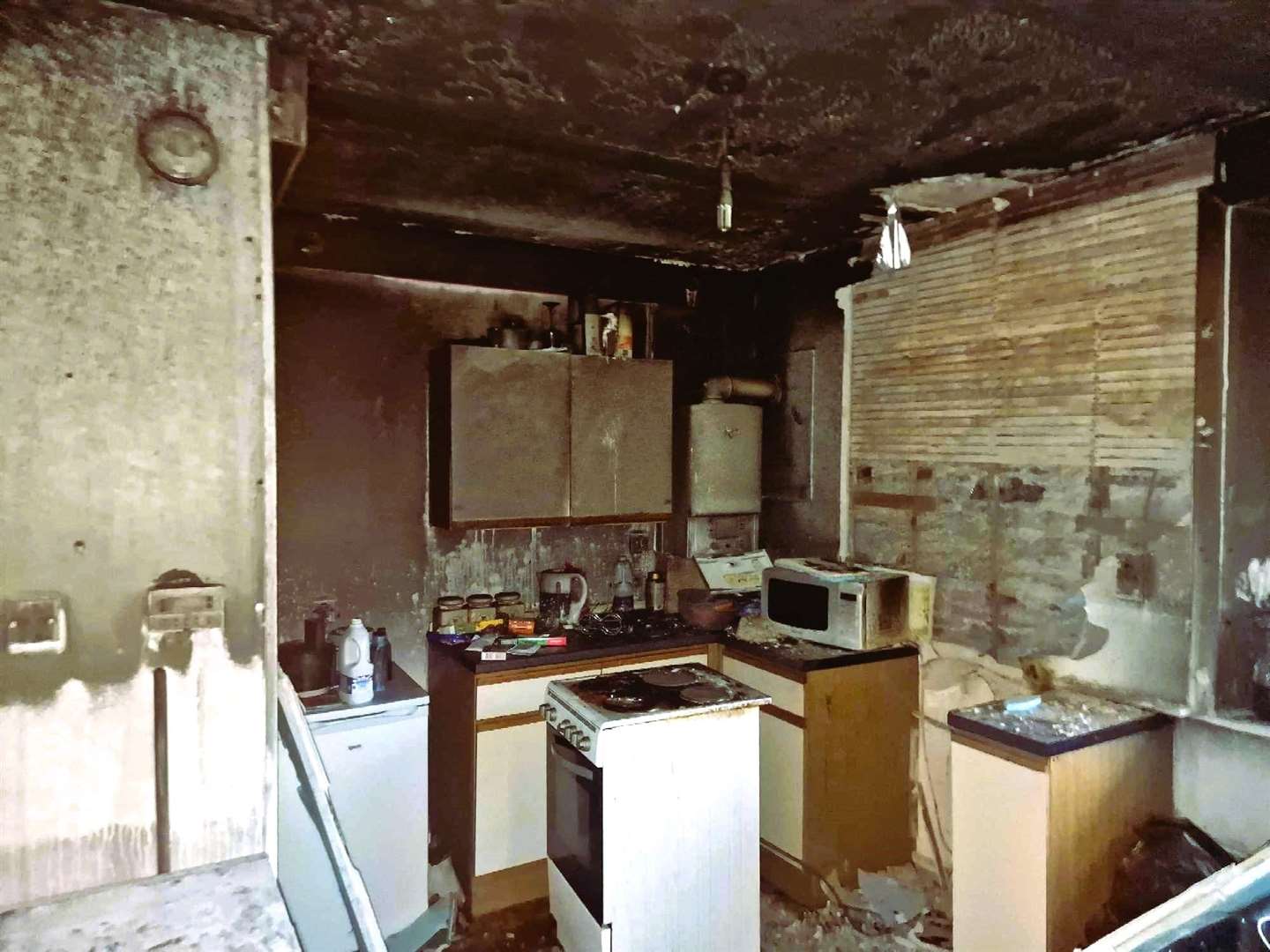 Interior of David Mackinnon's house after the fire in Wick that made him homeless.