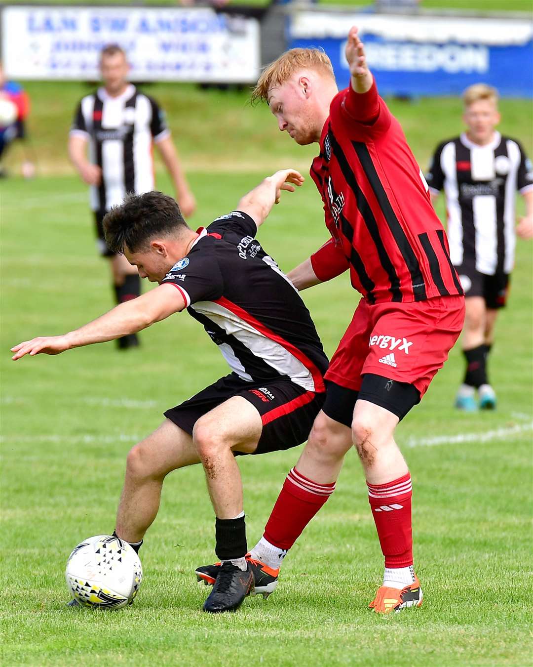 Academy midfielder Marc Coghill shields the ball from Fraserburgh's Logan Watt. Picture: Mel Roger