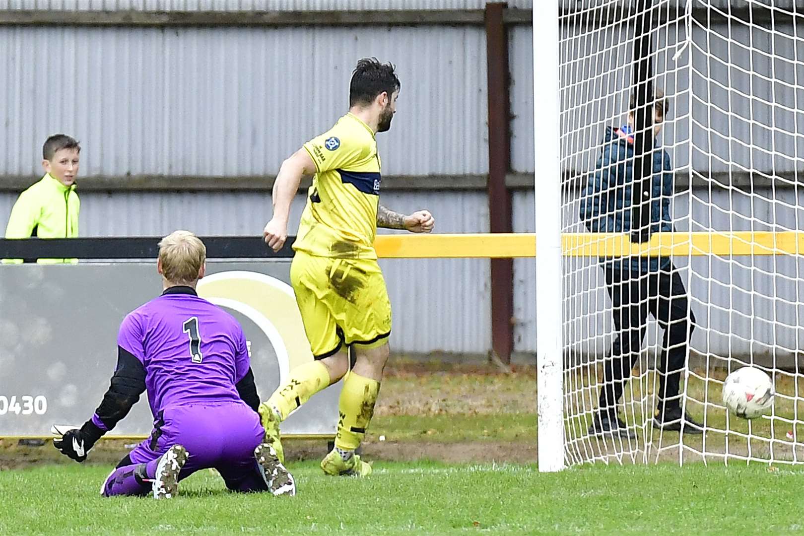Sam Mackay slots the ball into net after rounding Huntly keeper John Farquhar to get Academy back into the game. Picture: Mel Roger