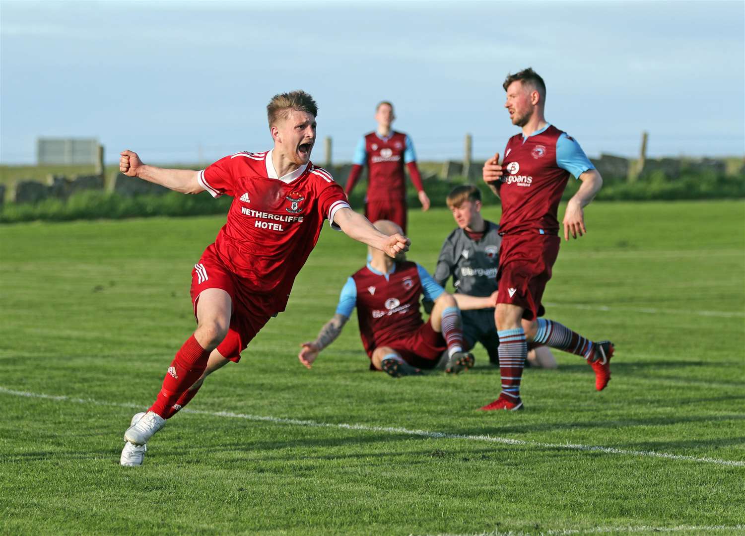 Korbyn Cameron celebrates opening the scoring for Wick Groats at Ham Park just before half-time. Picture: James Gunn