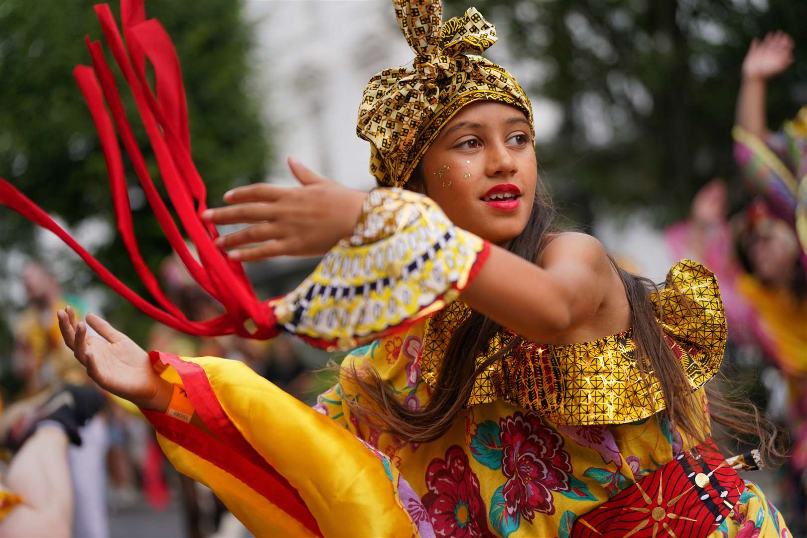 A performer in the children’s parade on Family Day at the Notting Hill Carnival (Victoria Jones/PA)