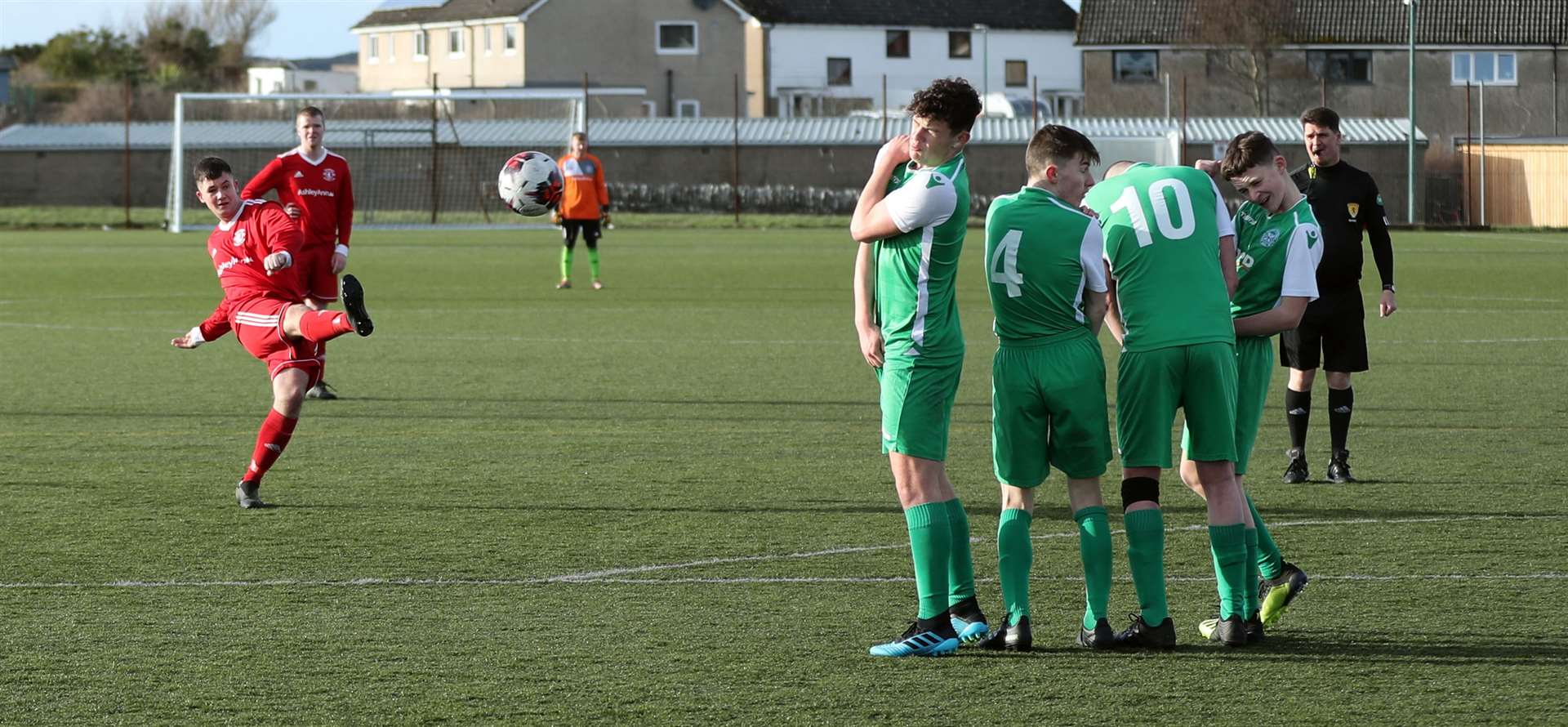 Connor Macintosh fires a free kick around the Bonar Bridge wall to score for Thurso during the 10-0 victory at Naver. Picture: James Gunn