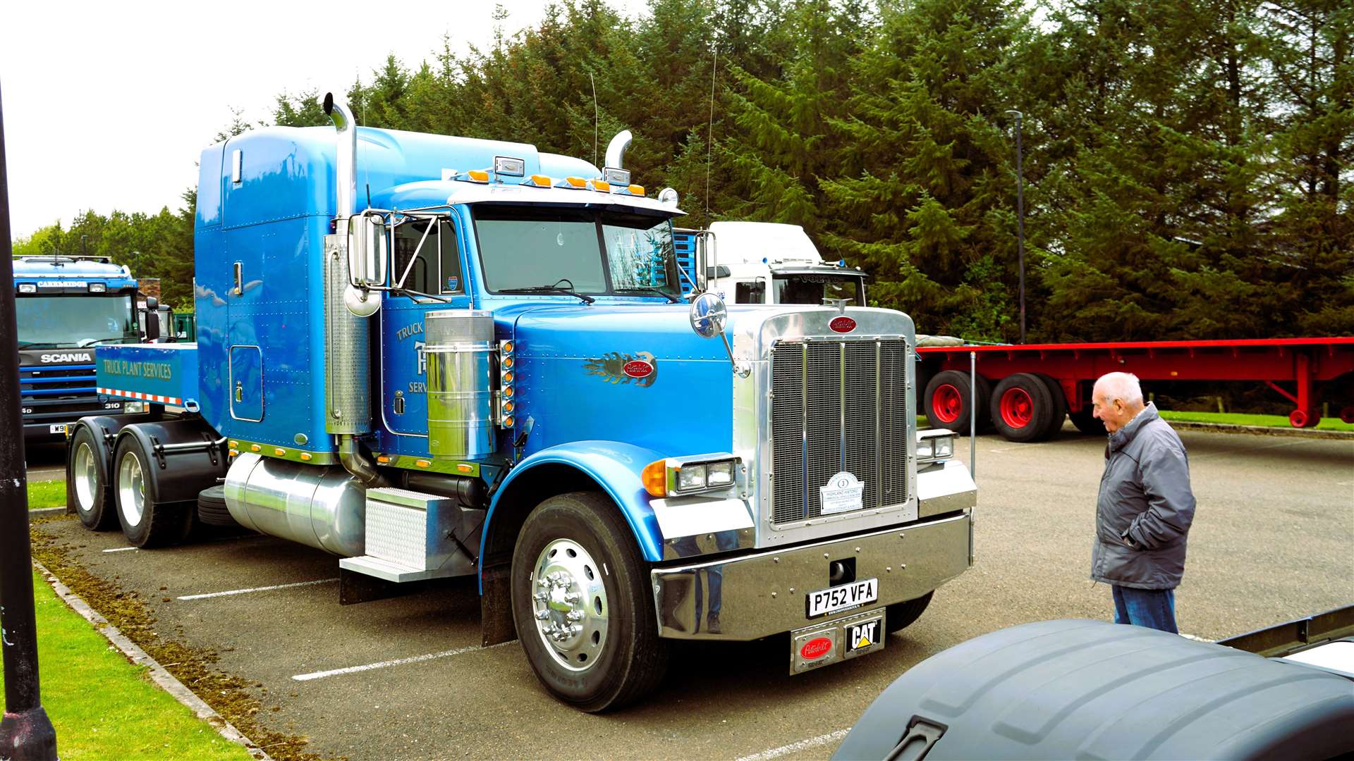 A visitor admires a sparkling American rig. Picture: DGS