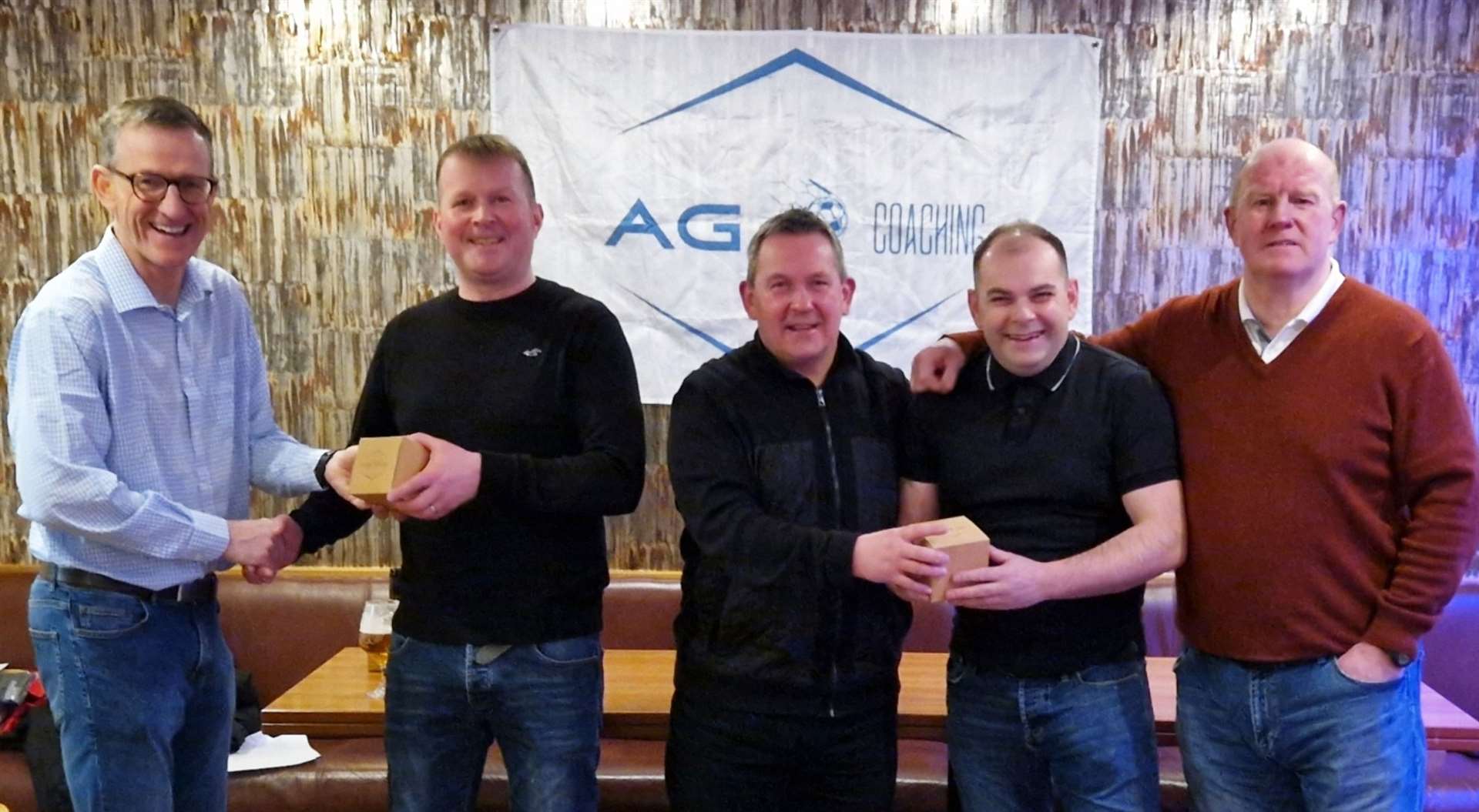 Two of the weekend sponsors, Michael Wilson (second from left) of MLG Electrical Contractor and Gary Reid (second from right) from Reids Bakery, receiving their mementoes from Brian Irvine, Billy Dodds and Duncan Shearer.
