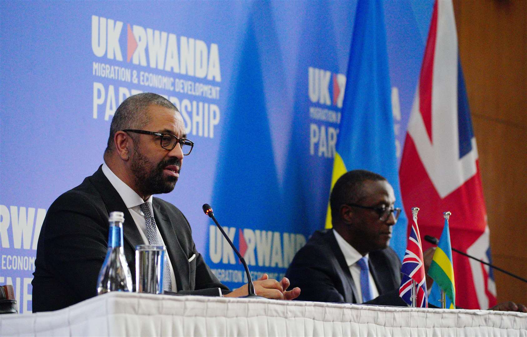 Home Secretary James Cleverly, left, with Rwandan minister of foreign affairs Vincent Biruta after signing the treaty (Ben Birchall/PA)