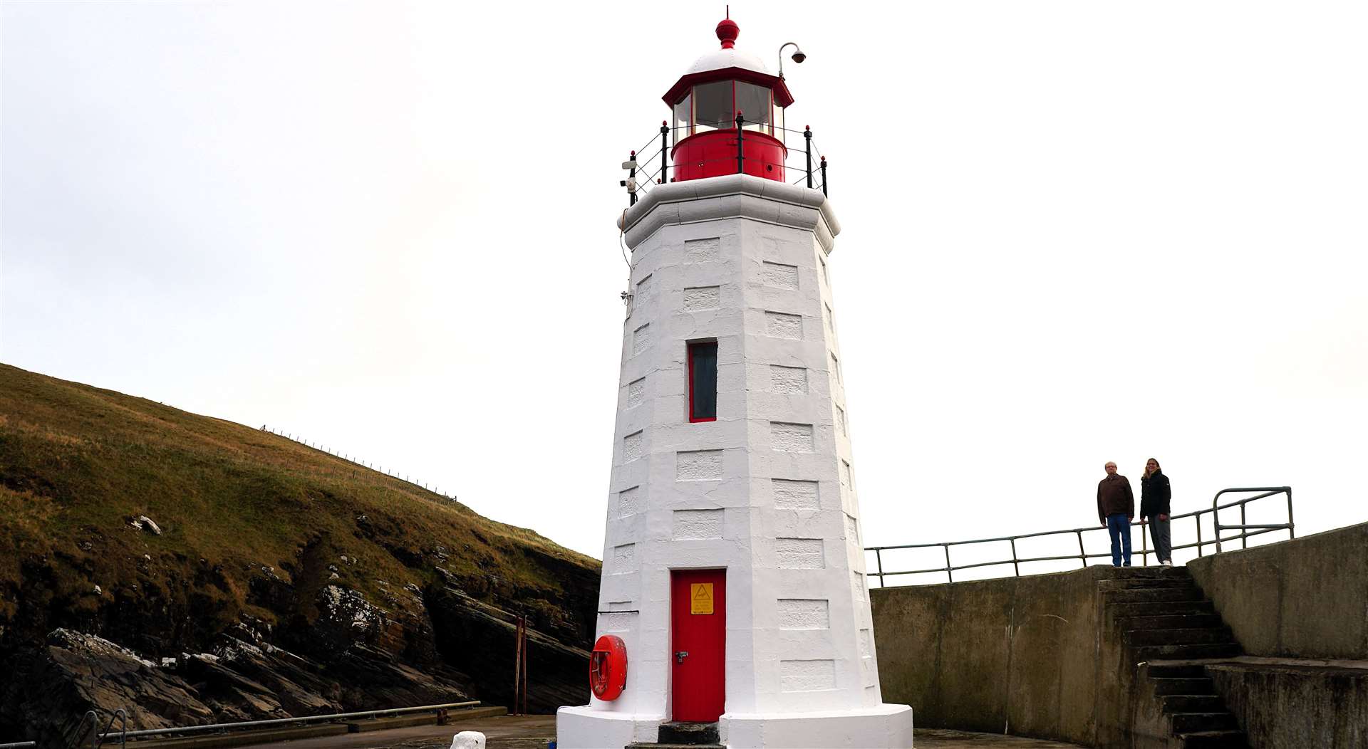 Lybster Harbour's lighthouse beams brightly after recently being repainted. Picture: DGS