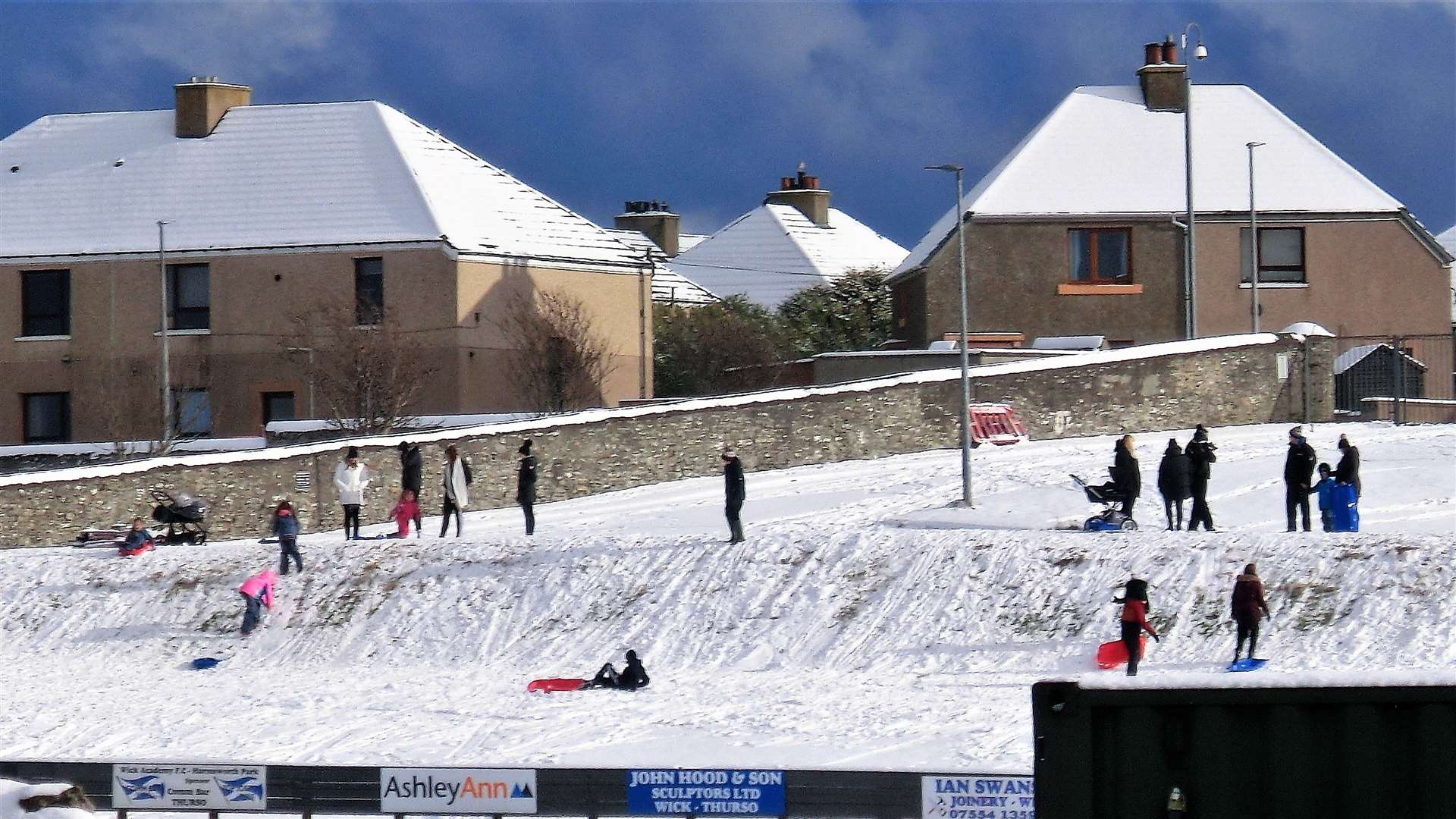 The slope at the top of Harmsworth Park in Wick was perfect for sledging on today. Picture: DGS