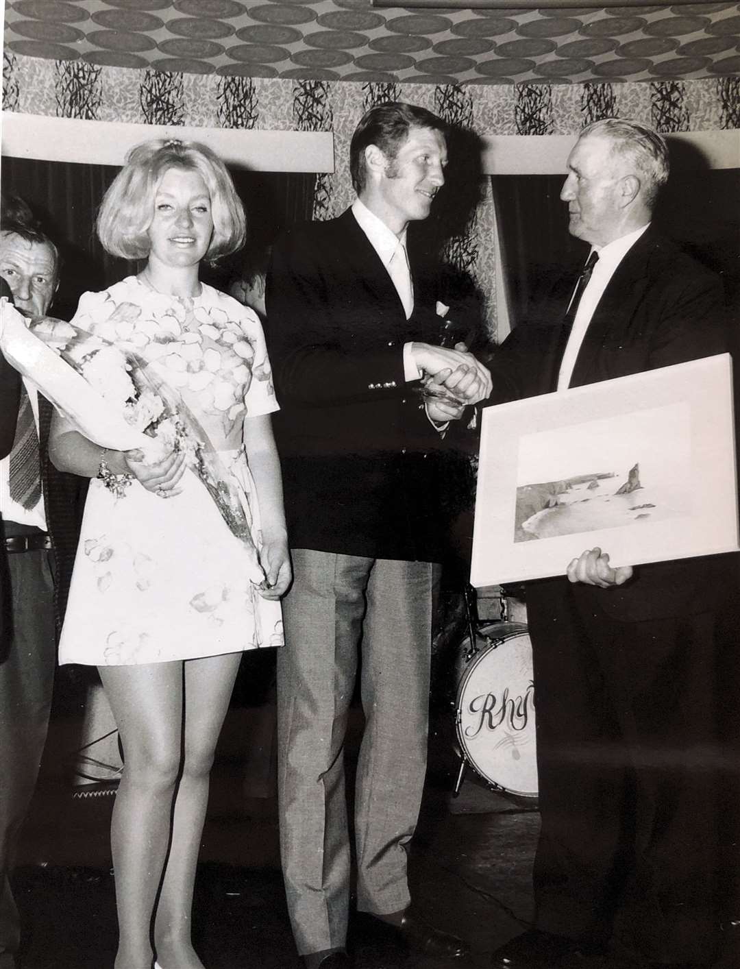 Billy McNeill and his wife Liz receive a framed painting from the president of the Caithness Celtic Supporters Club, Alec Manson, at the Station Hotel in Wick in July 1970. Picture: Caithness CSC