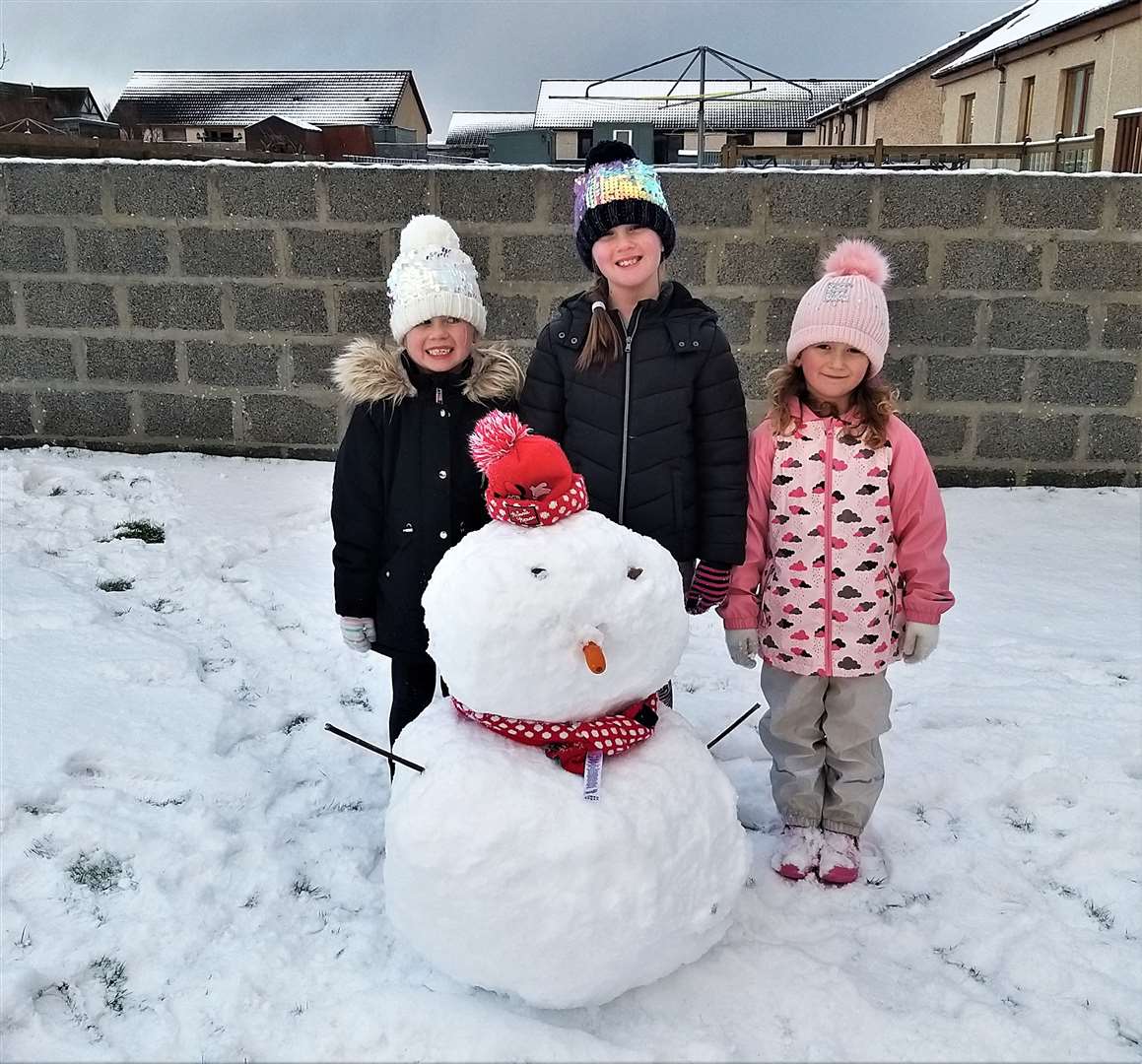 Amelia Miller, Ella Farquhar and Skyler Miller having fun in the Wick snow.