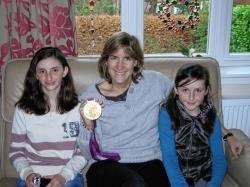 Katherine Grainger, with her Olympic medal, is flanked by Katie and Joanna Reiss, after they visited her in her parents’ house in Edinburgh just after she was made a CBE in the New Year honour’s list.