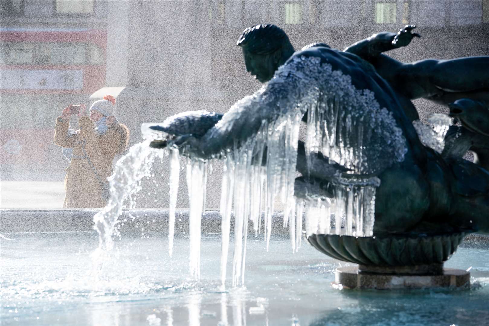 Frozen fountains in Trafalgar Square, London (Dominic Lipinski/PA)