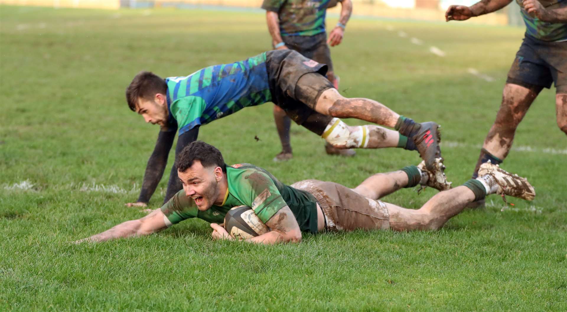 Marc Anderson shows his delight at diving over the try line to add to the Greens' tally. Picture: James Gunn