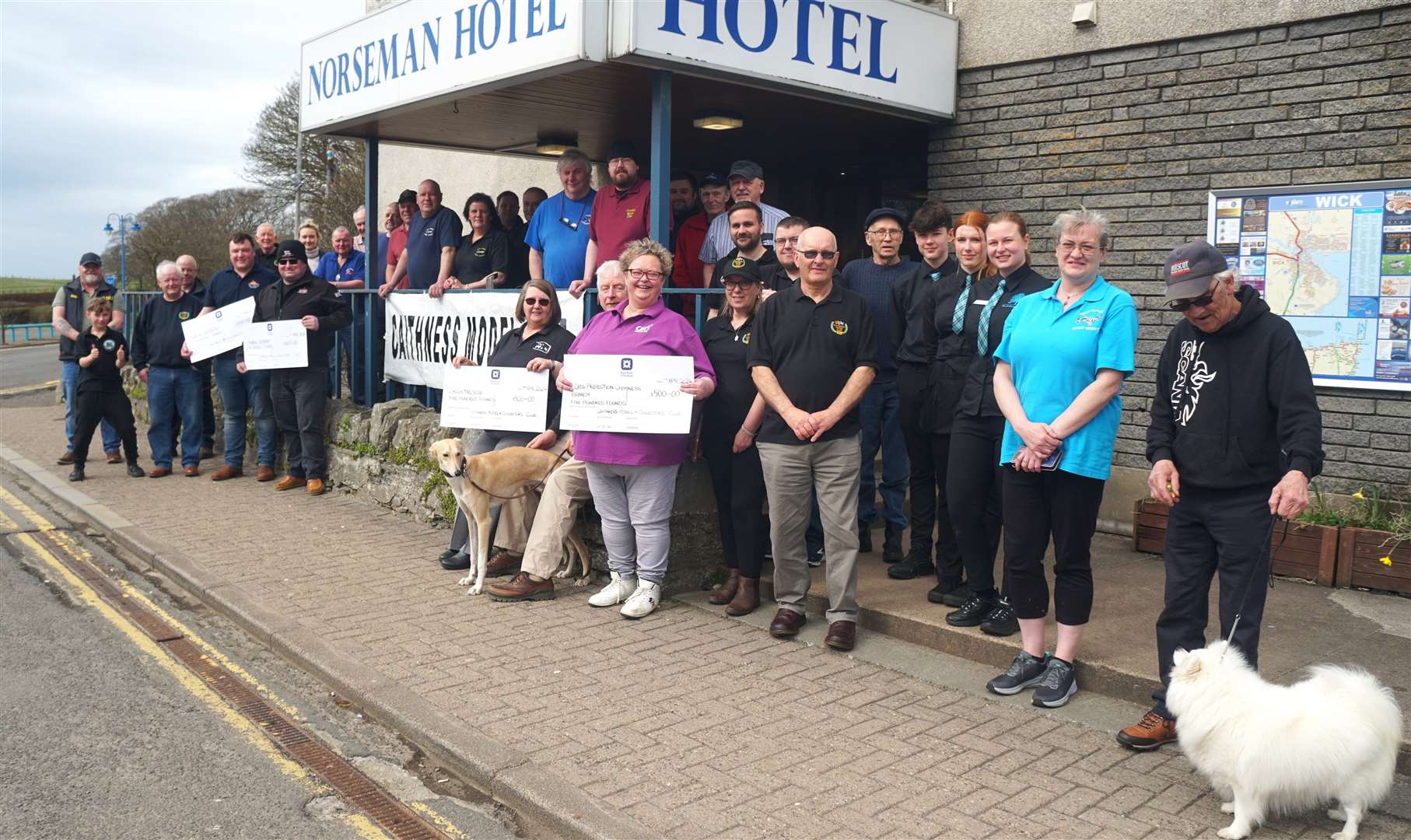 Four cheques totalling £2000 went to different charities thanks to the Caithness Model Club. Cats Protection, KWK9 Rescue, Thurso Lifeboat and Wick Lifeboat received £500 each at the handover outside the Norseman Hotel in Wick. Picture: DGS