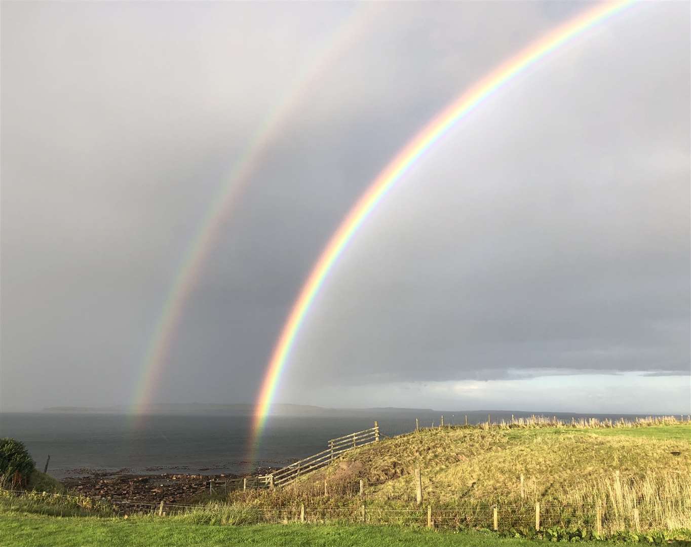 Lyall Rennie sent this dramatic shot of a double rainbow over the Pentland Firth with the island of Stroma in the background.