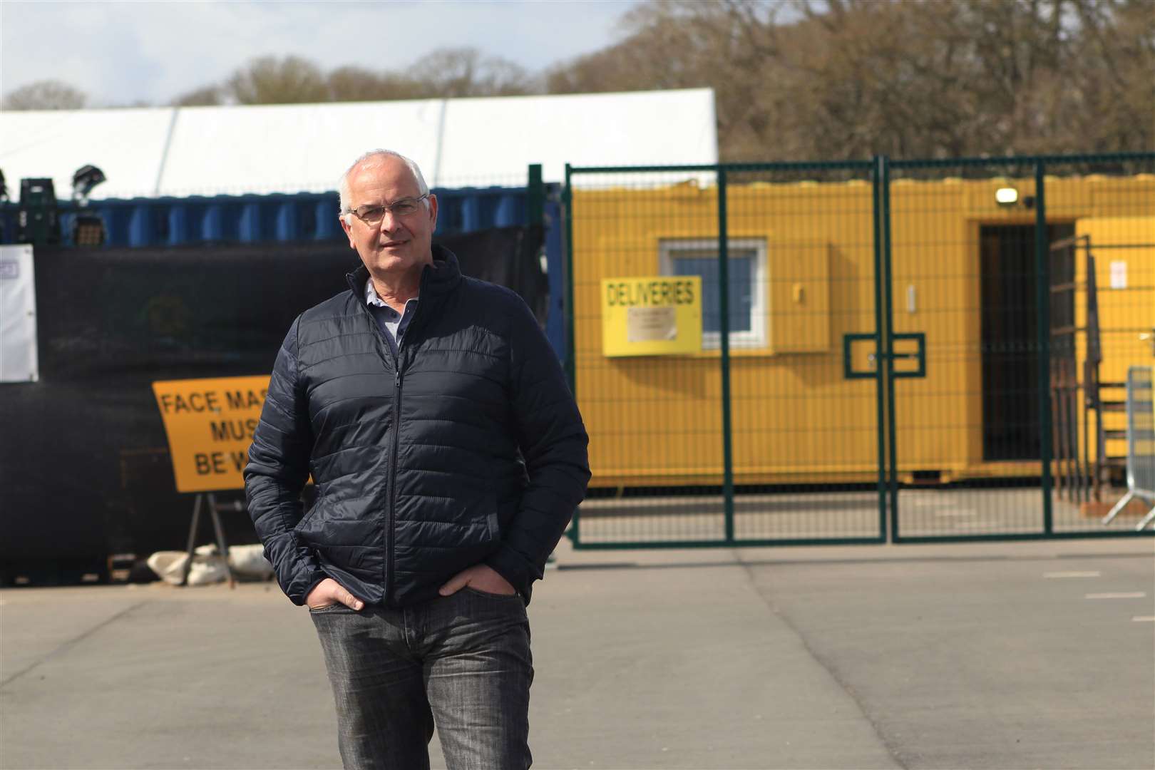 Highland councillor Raymond Bremner outside the Covid-19 testing centre in Wick's riverside car park this week. Picture: Alan Hendry