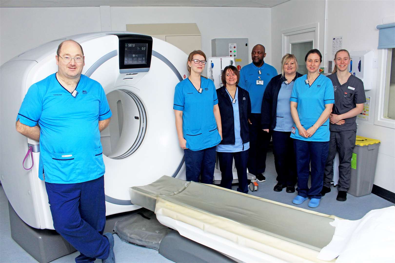 Some of the radiography team alongside the CT scanner at Caithness General Hospital. Picture: Alan Hendry