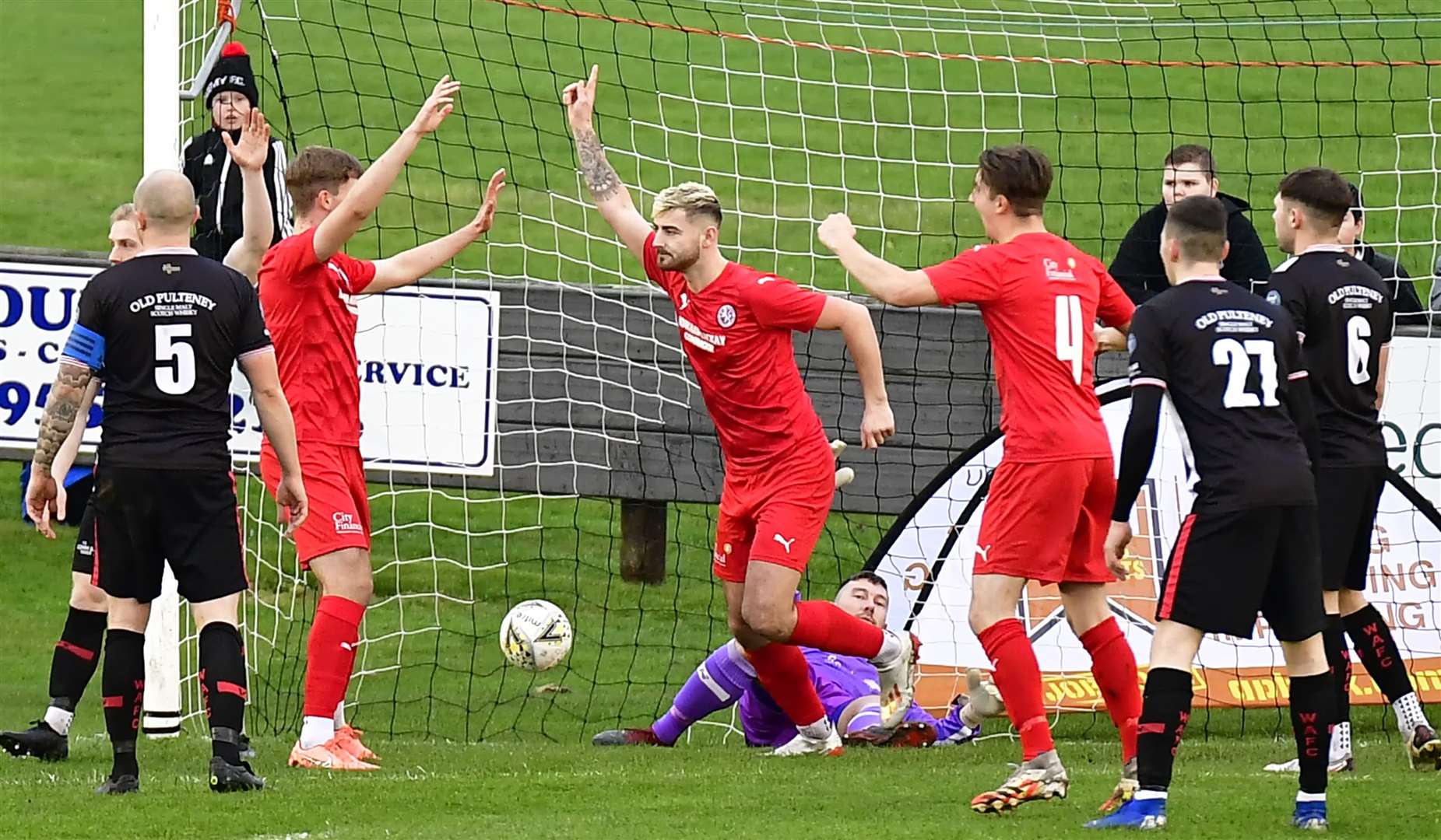 Jordan MacRae turns away to celebrate after giving Brora Rangers an early lead in Saturday's Highland League Cup tie at Wick. Picture: Mel Roger