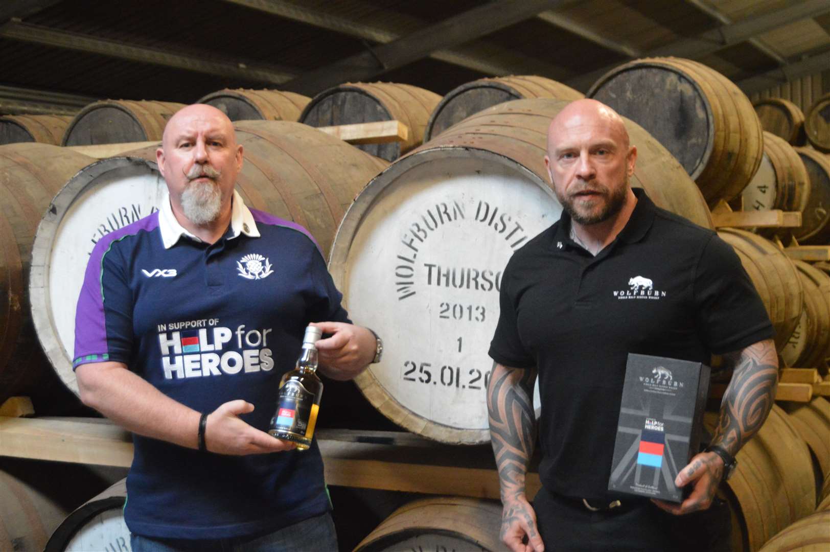 Mark Westmorland (left), Wolfburn’s brand ambassador, with para-athlete and weightlifter Micky Yule at the launch of the Help for Heroes whisky.