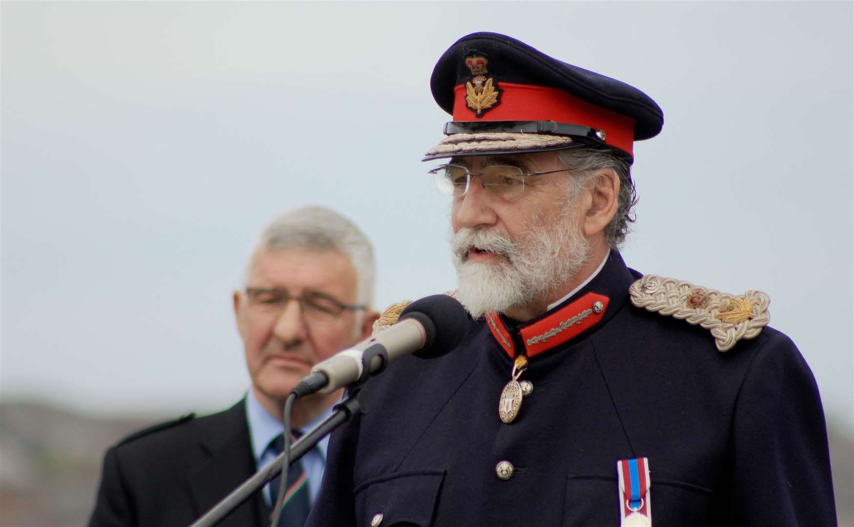 Lord Thurso, the Lord-Lieutenant of Caithness, speaking at Saturday's event in Wick, with Willie Watt behind. Picture: Alan Hendry