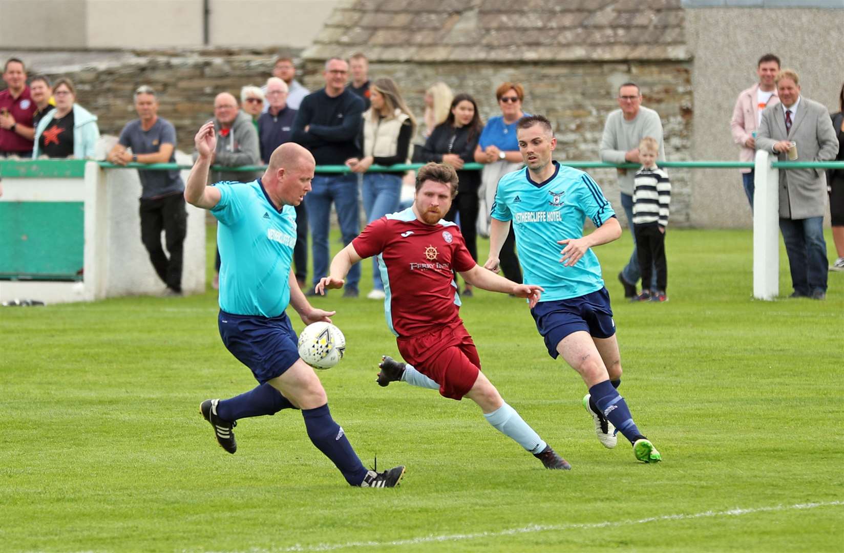 Alan Sinclair (left) in action during Wick Groats' 1-0 victory over Stromness Athletic in their 2023 Highland Amateur Cup semi-final at Castletown. Picture: James Gunn