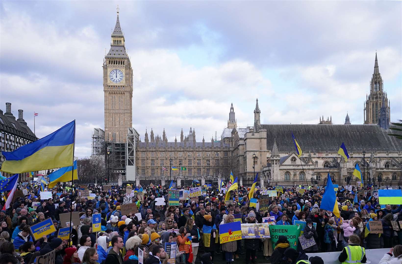 People take part in a demonstration in Parliament Square (Ian West/PA)