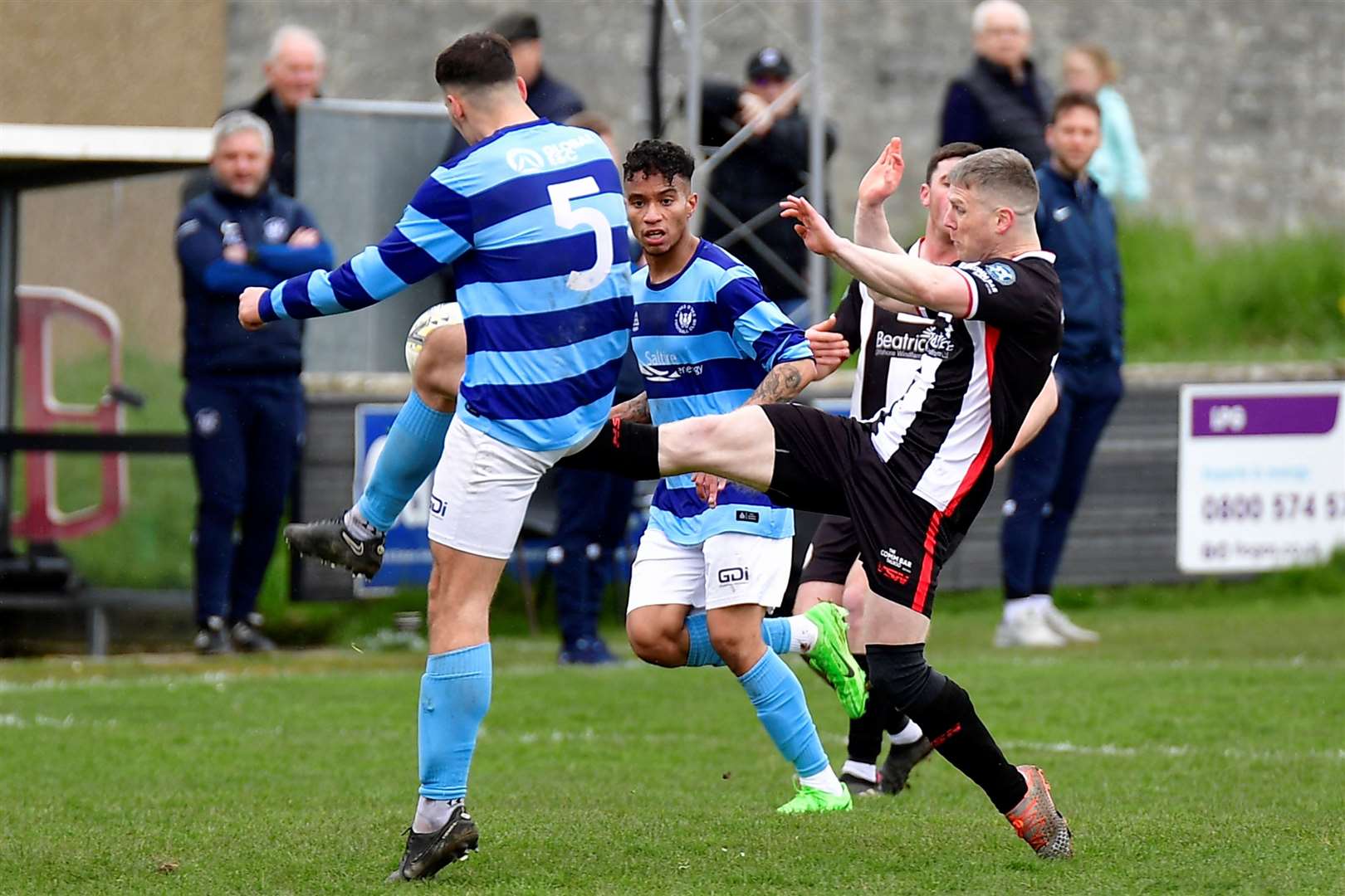 Davie Allan stretches to beat Banks O' Dee defender Kacper Lewecki to the ball. Picture: Mel Roger