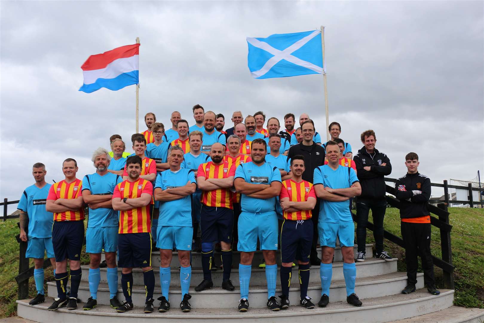 Players from John O'Groats and FC Staantribune before Saturday's challenge match at Folke Park.