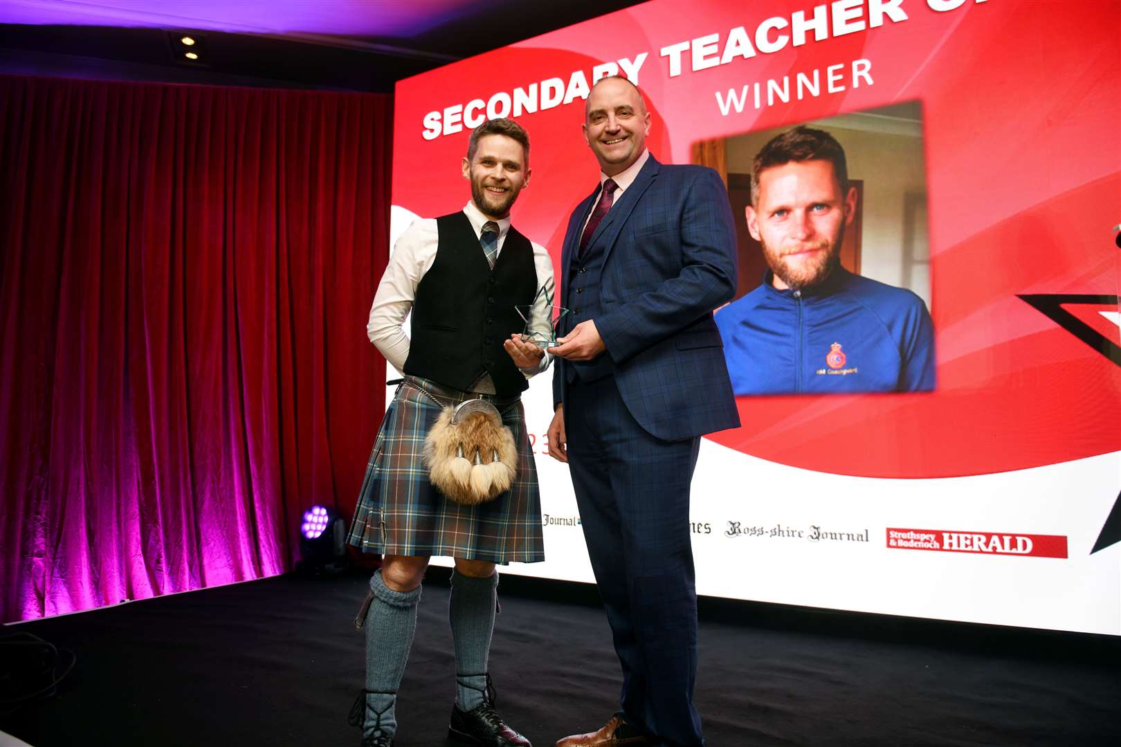 Chris Aitken (left) won the secondary teacher award, presented by Kevin Urquhart of category sponsor Barratt Homes. Picture: James Mackenzie
