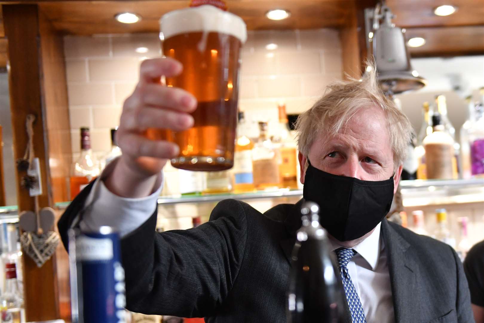 Boris Johnson was criticised over pubs and restaurants being reopened before schools in summer 2020 (PA)