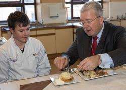 Scottish Education Minister Mike Russell samples a dish prepared by Wick High School fourth year pupil Liam McAdie who is once again competing in the Future Chef Competition, in which he took runner-up last year. Picture: Robert MacDonald / Northern Studi