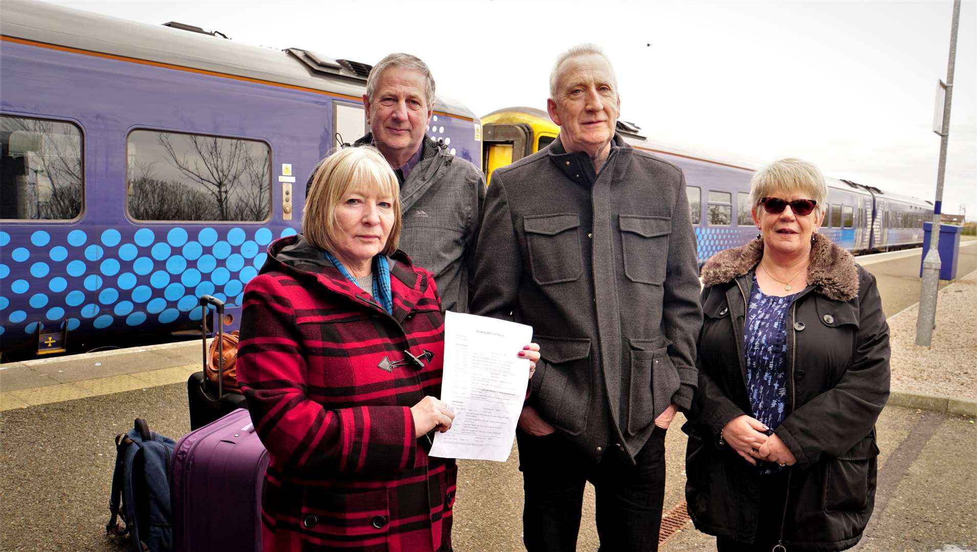 From left, Theresa and Jim Coull together with Charlie and Fiona Simpson. These two couples had travelled up from Keith to Wick on Friday and said there was a staffing problem on their outward journey as well. Picture: DGS