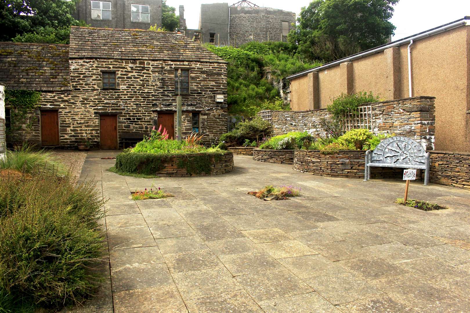 The Bank Row memorial garden commemorates those who died in two bombing raids in 1940. This picture was taken after the planting and weeding session on Saturday.
