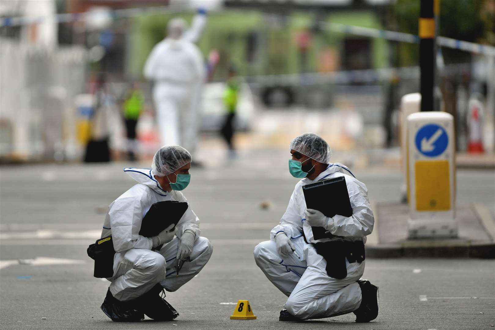 Forensics officers at work in Hurst Street (Jacob King/PA)