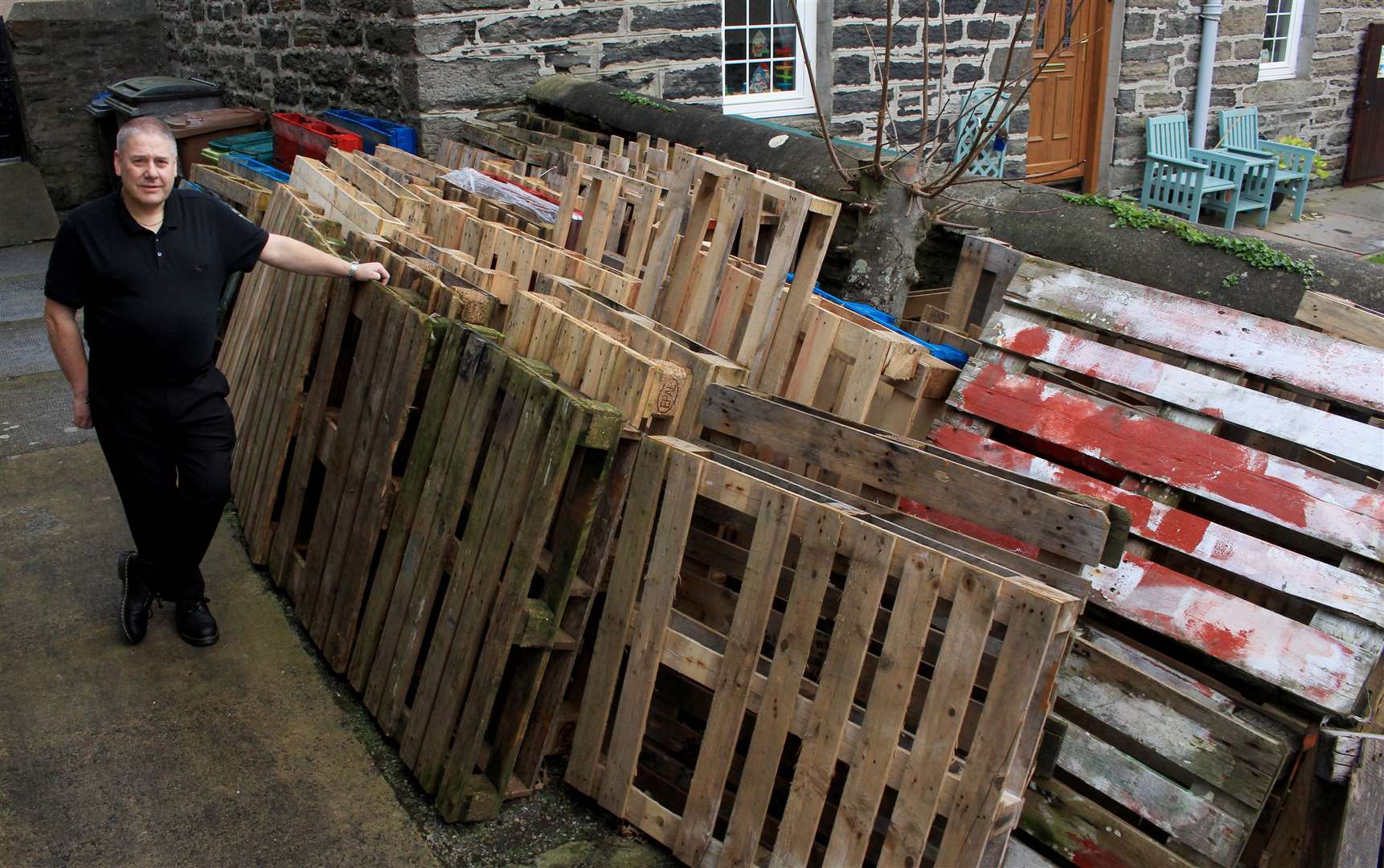 Event organiser Mervyn Hill had gathered between 60 and 70 wooden pallets from local businesses to be used in the Bignold Park bonfire, which has now been cancelled. Picture: Alan Hendry
