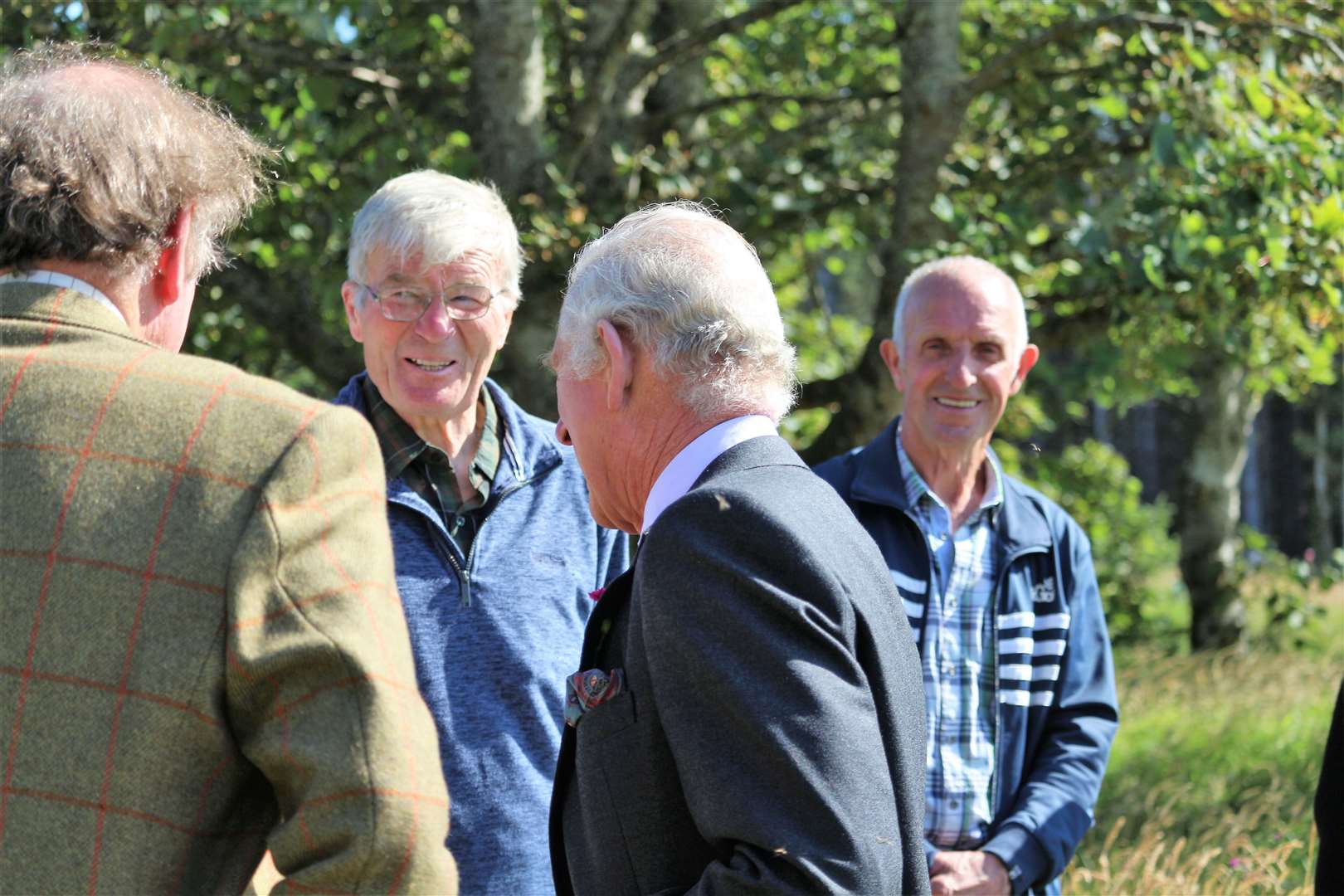 Prince Charles meets tree planting volunteers Robbie Keith and John Campbell at Dunnet Forest.