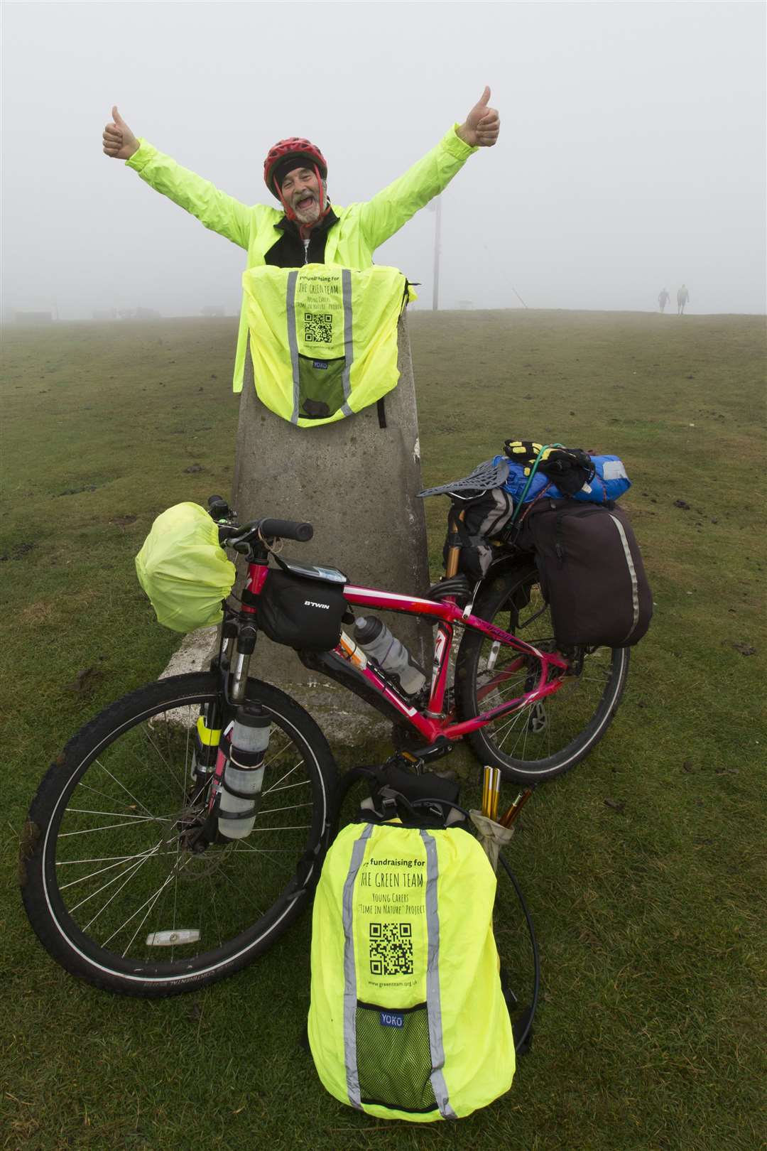 Peter Wright celebrates reaching the trig point at Duncansby Head. Picture: Robert MacDonald/Northern Studios