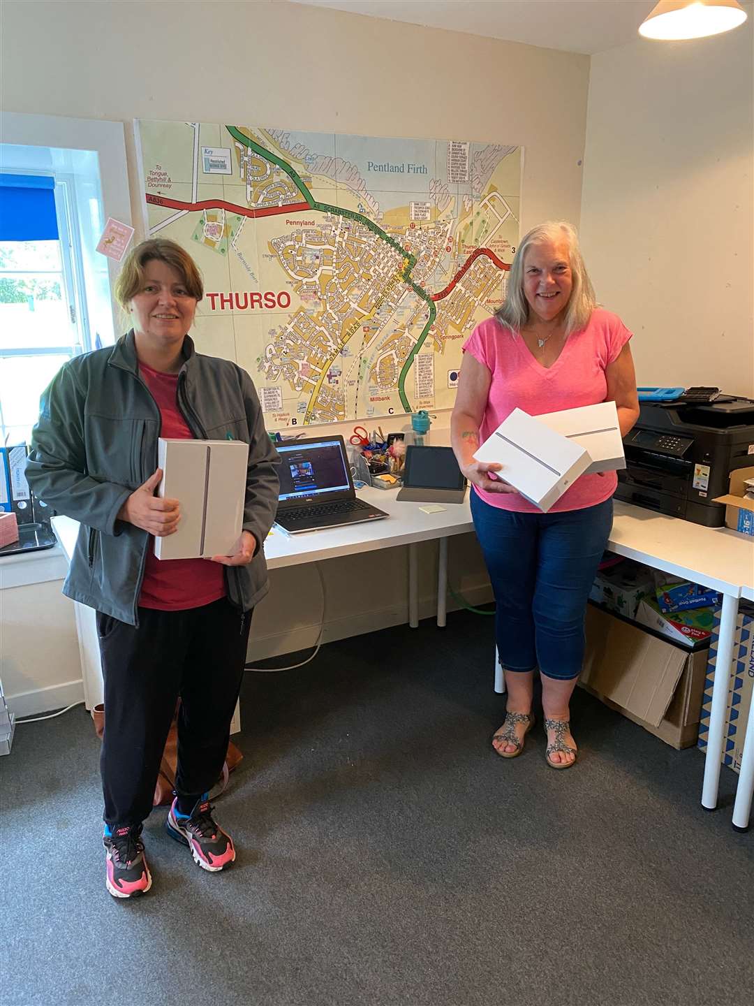 One of the project co-ordinators Ann Brock (left) and Thurso Community Development Trust chairperson Helen Allan are pictured here with some of the digital devices.