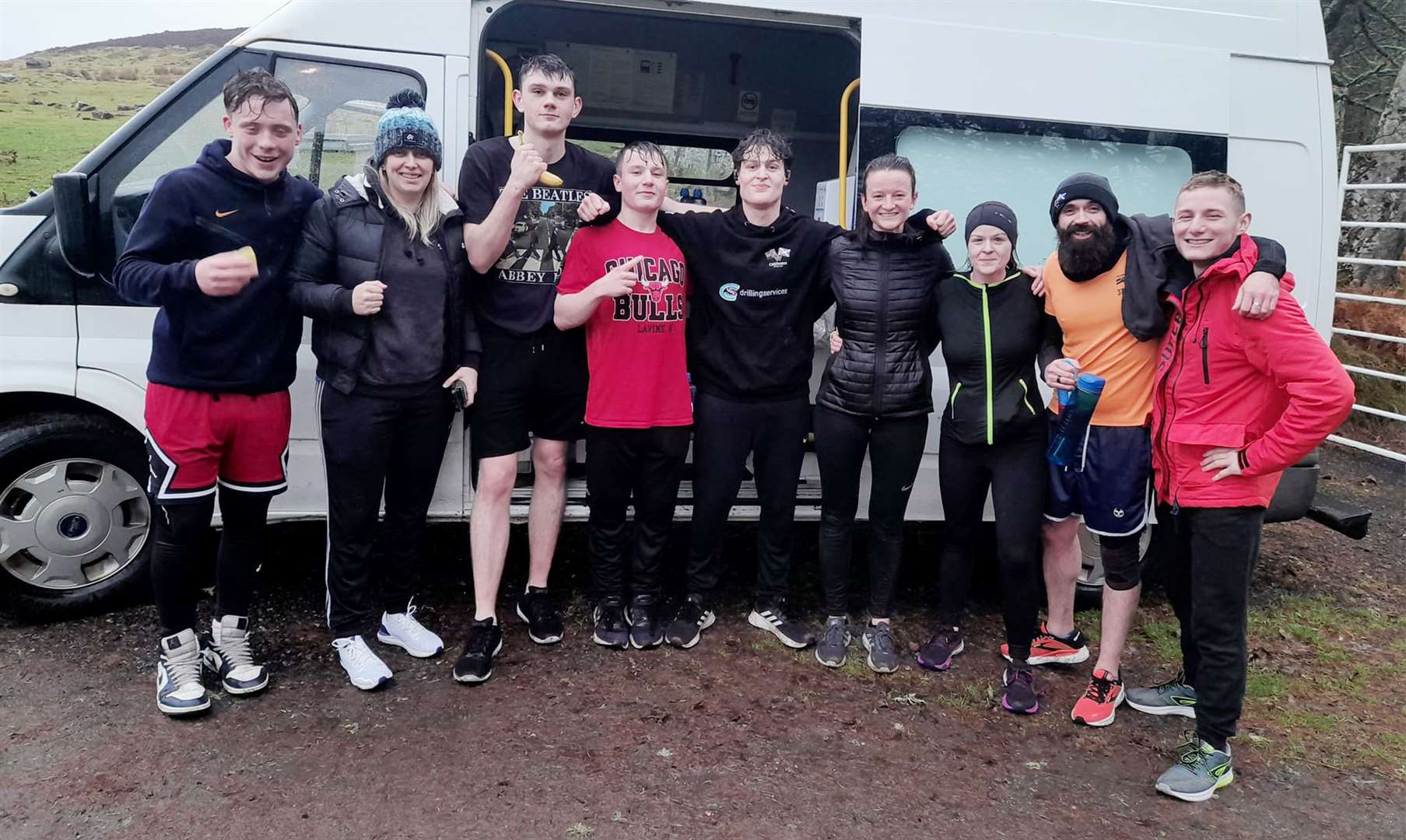 From left: Harry Whitworth, Lisa Robertson (coach), Aaron Sinclair, Koby Stewart, Nathan Tait, Mary MacGillivray, Sam Mackechnie, Andy Sinclair and Cailean Fraser (coach) after this month's Berriedale 10k fundraiser.
