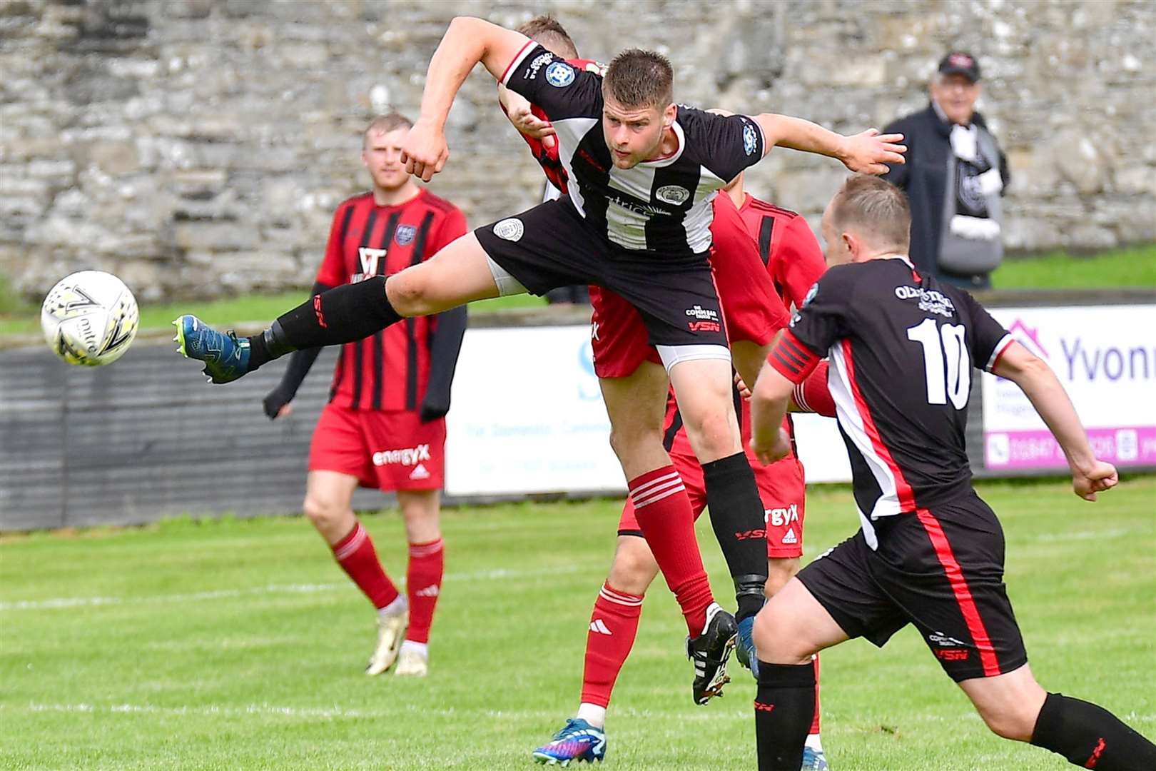 Marc Macgregor beats Fraserburgh's Greg Buchan to the ball. Picture: Mel Roger