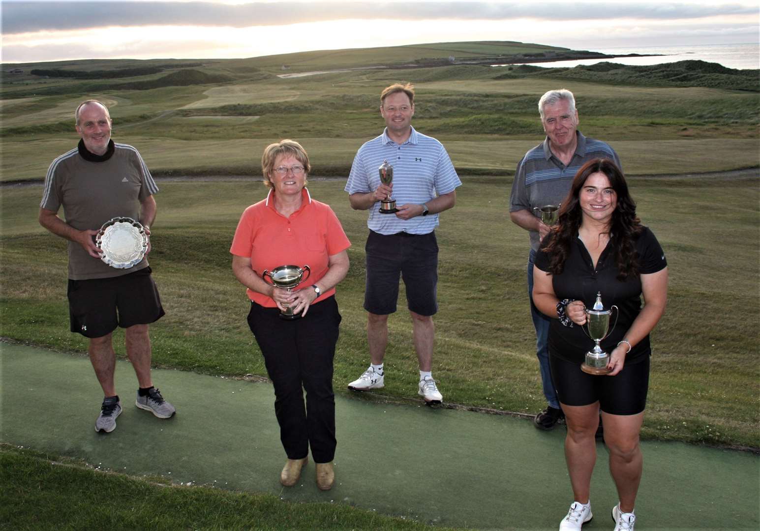 Prize-winners from all the club championship competitions at Reay – (from left) Andy Mowat, gents' handicap winner; Tricia Macdonald, ladies' handicap winner; Colin Paterson, gents' scratch winner; Alex Anderson, gents' senior winner; and Eleanor Tunn, ladies' scratch winner. Picture: Fred Groves