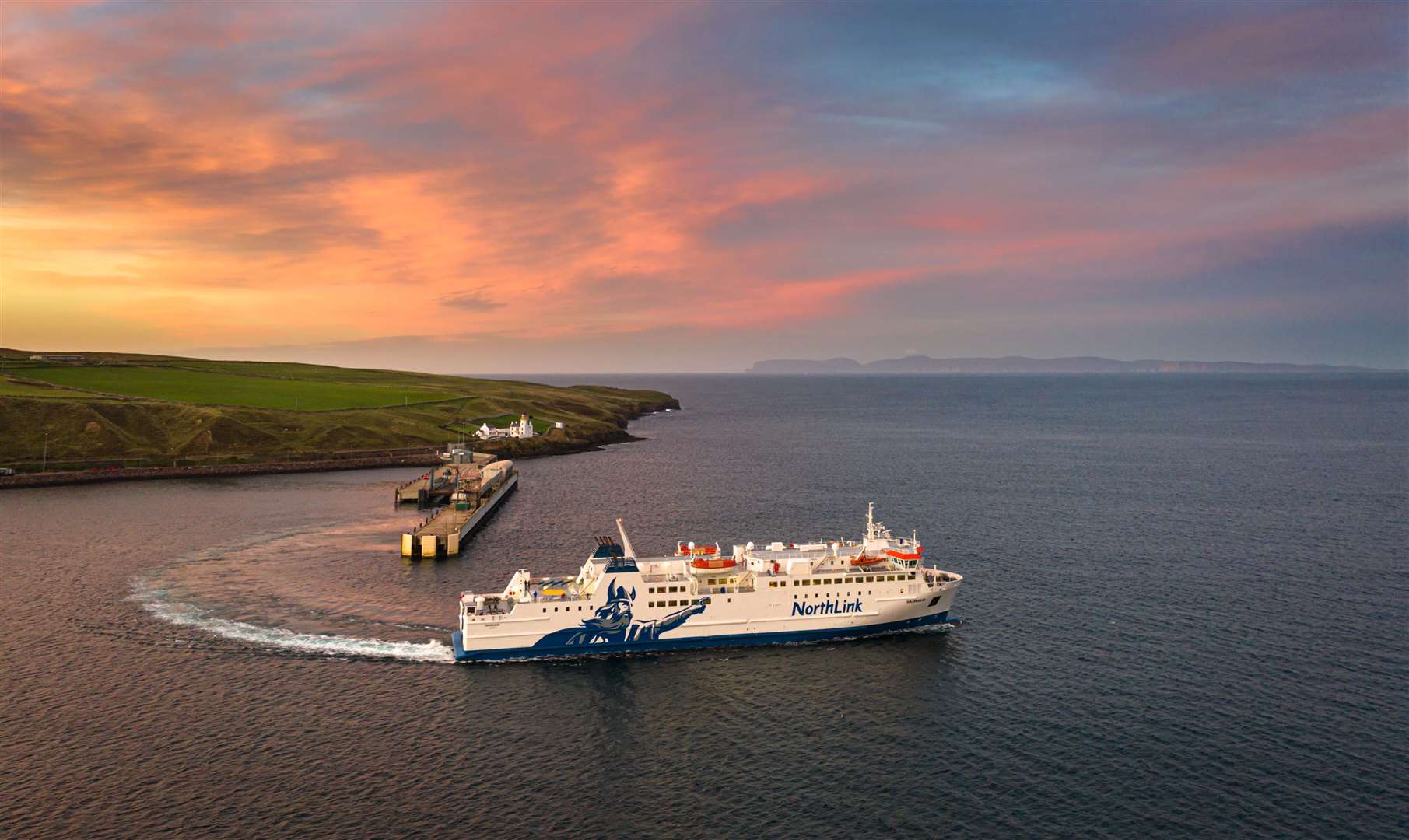 NorthLink Ferries' Hamnavoe vessel leaves the port at Scrabster, where it is 'plugged in' overnight. Picture: Serco NorthLink Ferries