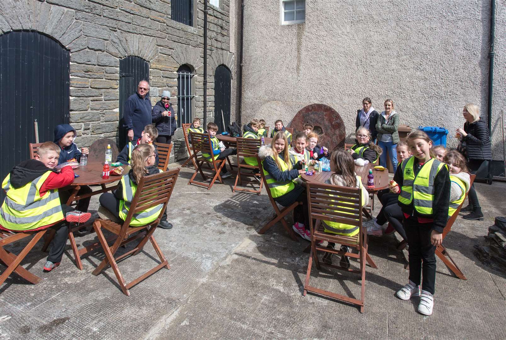 The Noss pupils having a break in the courtyard at Wick Heritage Museum during their tour. Picture: Fergus Mather